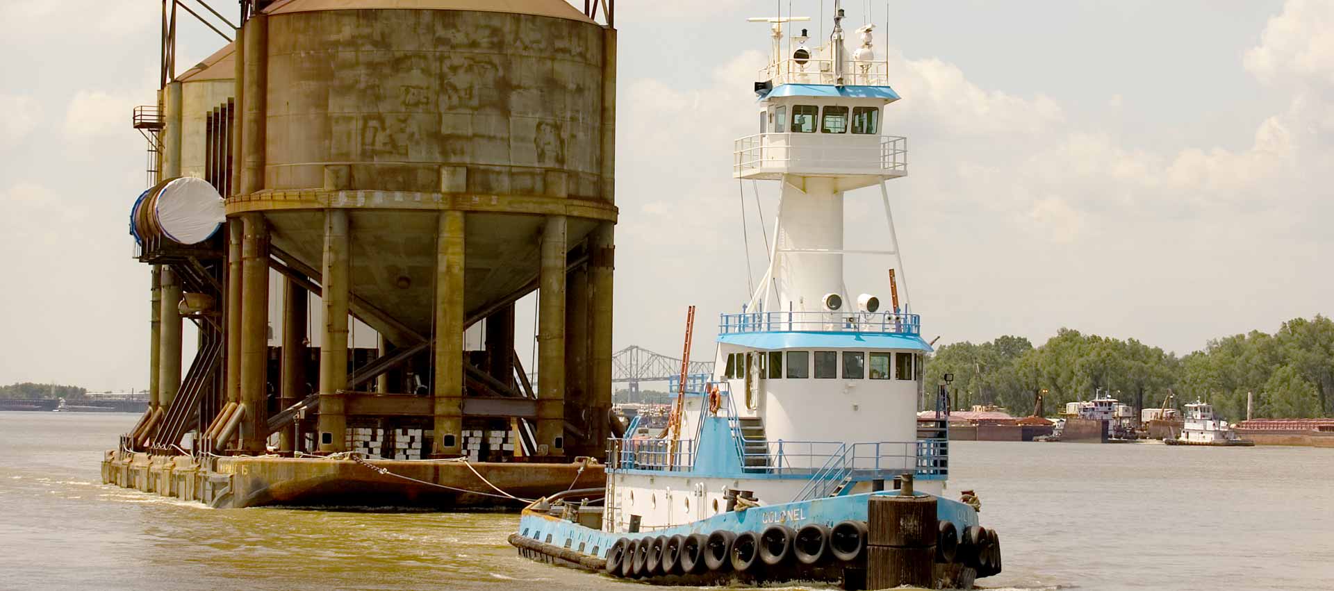 tug-boat-pulling-cargo